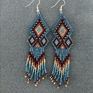 - Beaded earrings with fringe